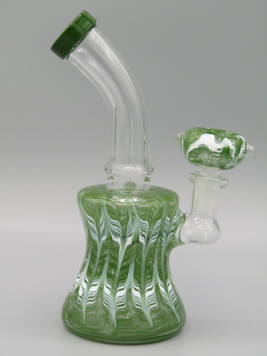 Right side view 6.5" raked glass, bent neck, bell shaped water bong in green.