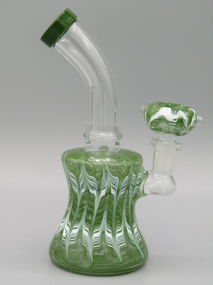 Right side view 6.5" raked glass, bent neck, bell shaped water bong in green.