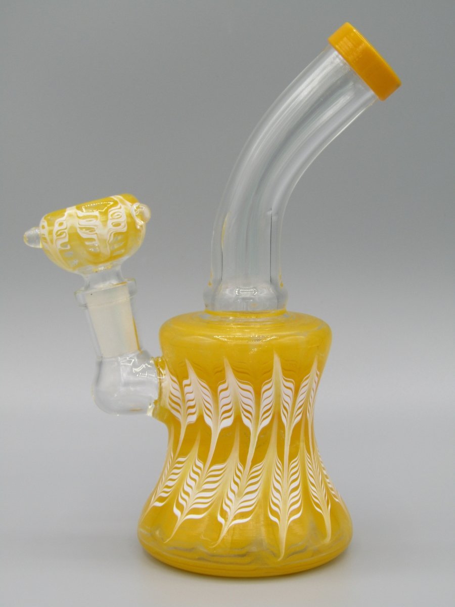 Left side view 6.5" raked glass, bent neck, bell shaped water bong in yellow.