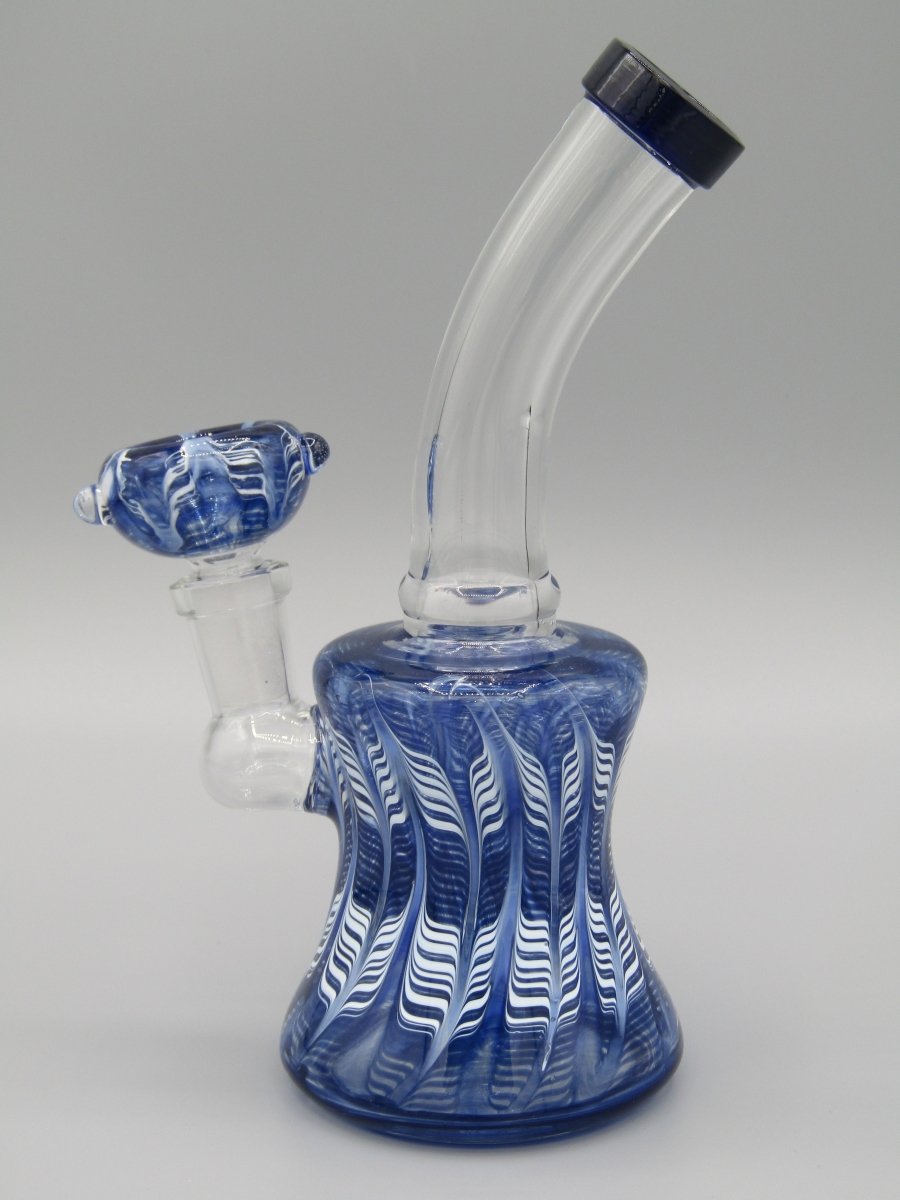 Left side view 6.5" raked glass, bent neck, bell shaped water bong in blue.