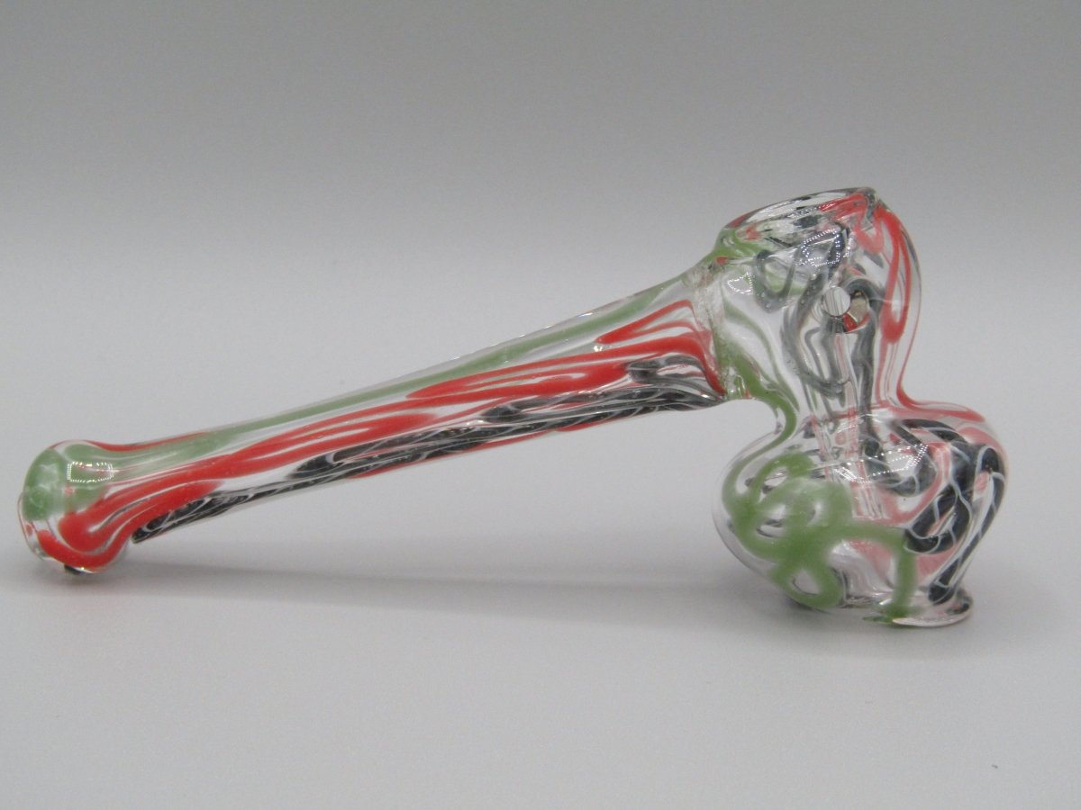 Right side view 4" mini swirl bubbler with black, orange, and green color combo.