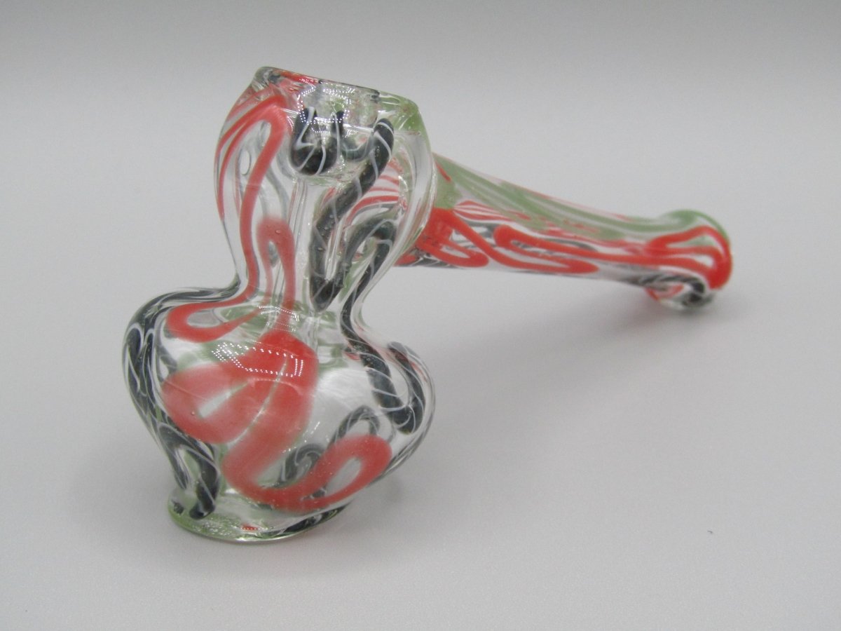 Zoom view 4" mini swirl bubbler with black, orange, and green color combo.