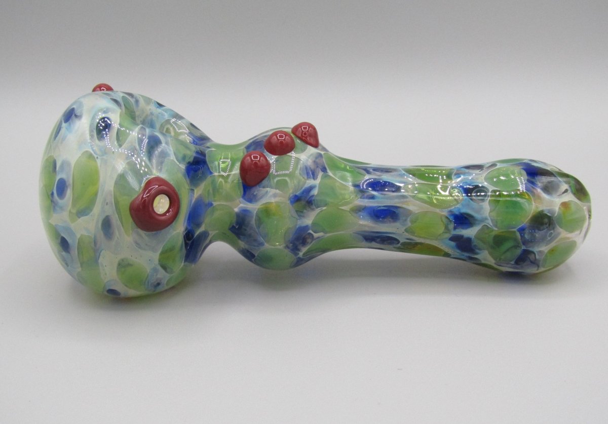 Left side view 6" double blown spoon hand pipe w/ multiple knockers...bubble trap and mixed fumed glass w/ blue/green/white color combo.