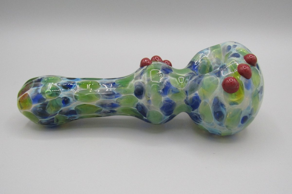 Right side view 6" double blown spoon hand pipe w/ multiple knockers...bubble trap and mixed fumed glass w/ blue/green/white color combo.