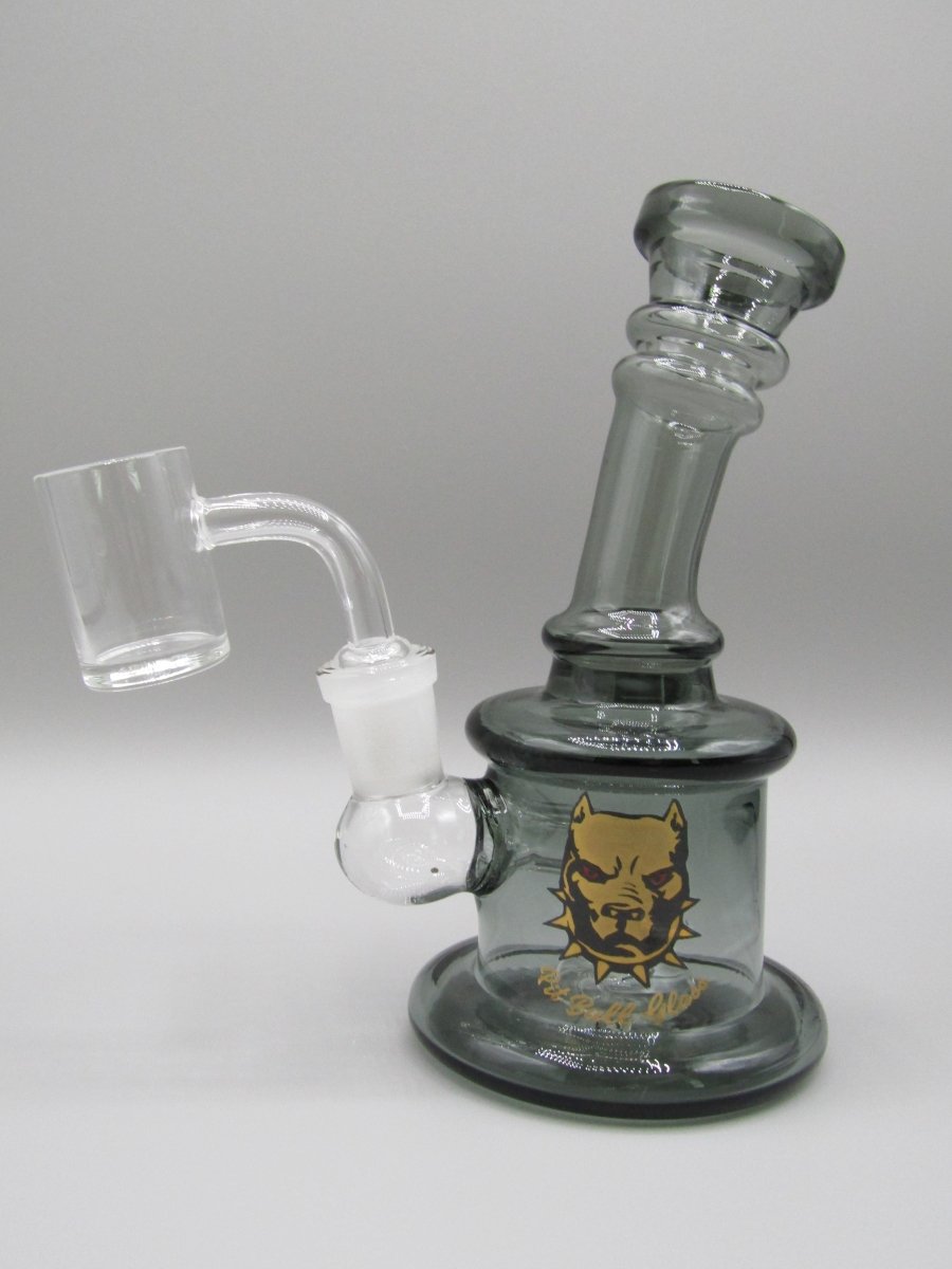 Left side view 6.5" ringed, bent neck rig with circular percolator, thick glass base and smoke color.