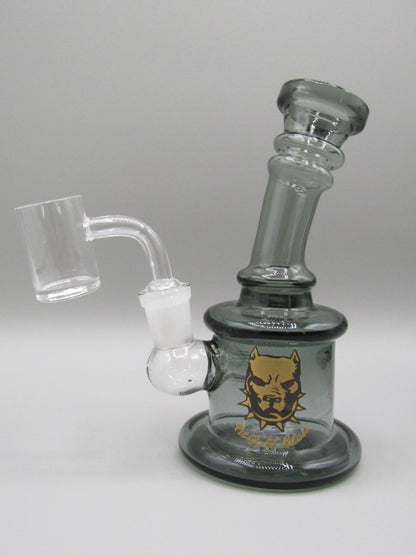 Left side view 6.5" ringed, bent neck rig with circular percolator, thick glass base and smoke color.