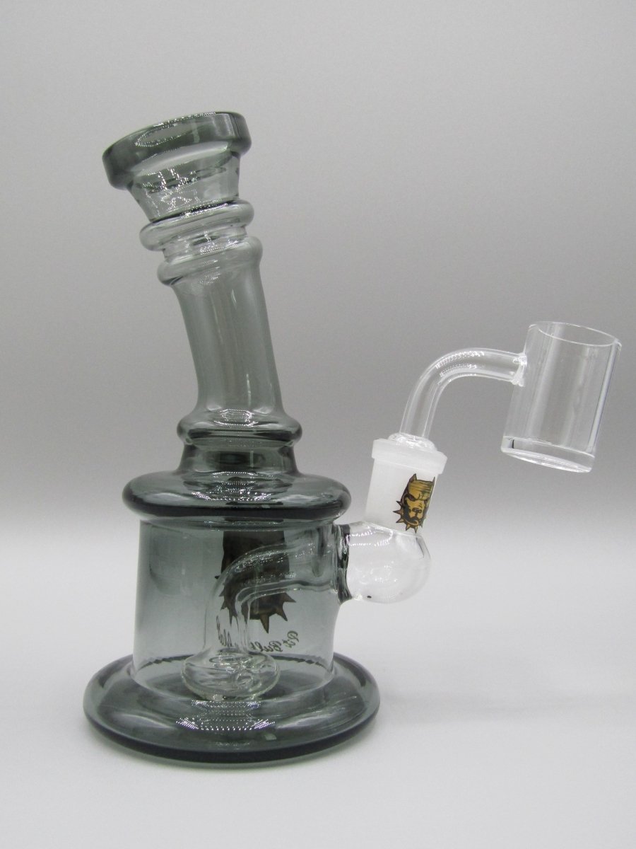 Right side view 6.5" ringed, bent neck rig with circular percolator, thick glass base and smoke color.