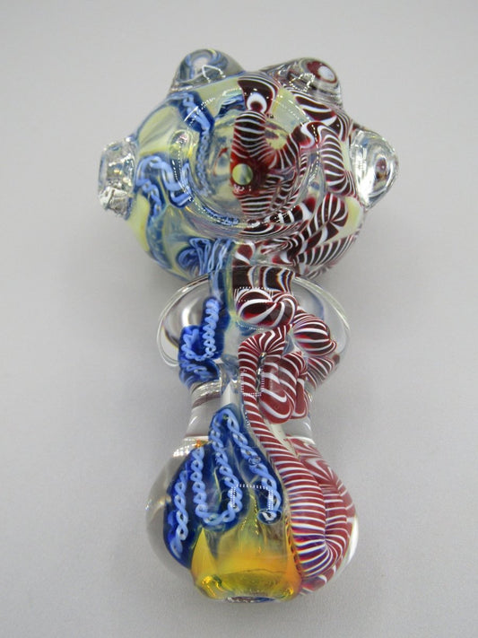 Top view 4" triple blown, ringed, spoon hand pipe w/ multiple knockers...ribboned and gold fumed glass  w/ multi color accents.