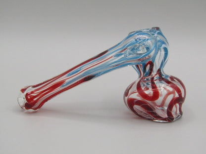 Right side view 4" sidecar swirl hammer bubbler w/ blue and red color accents.