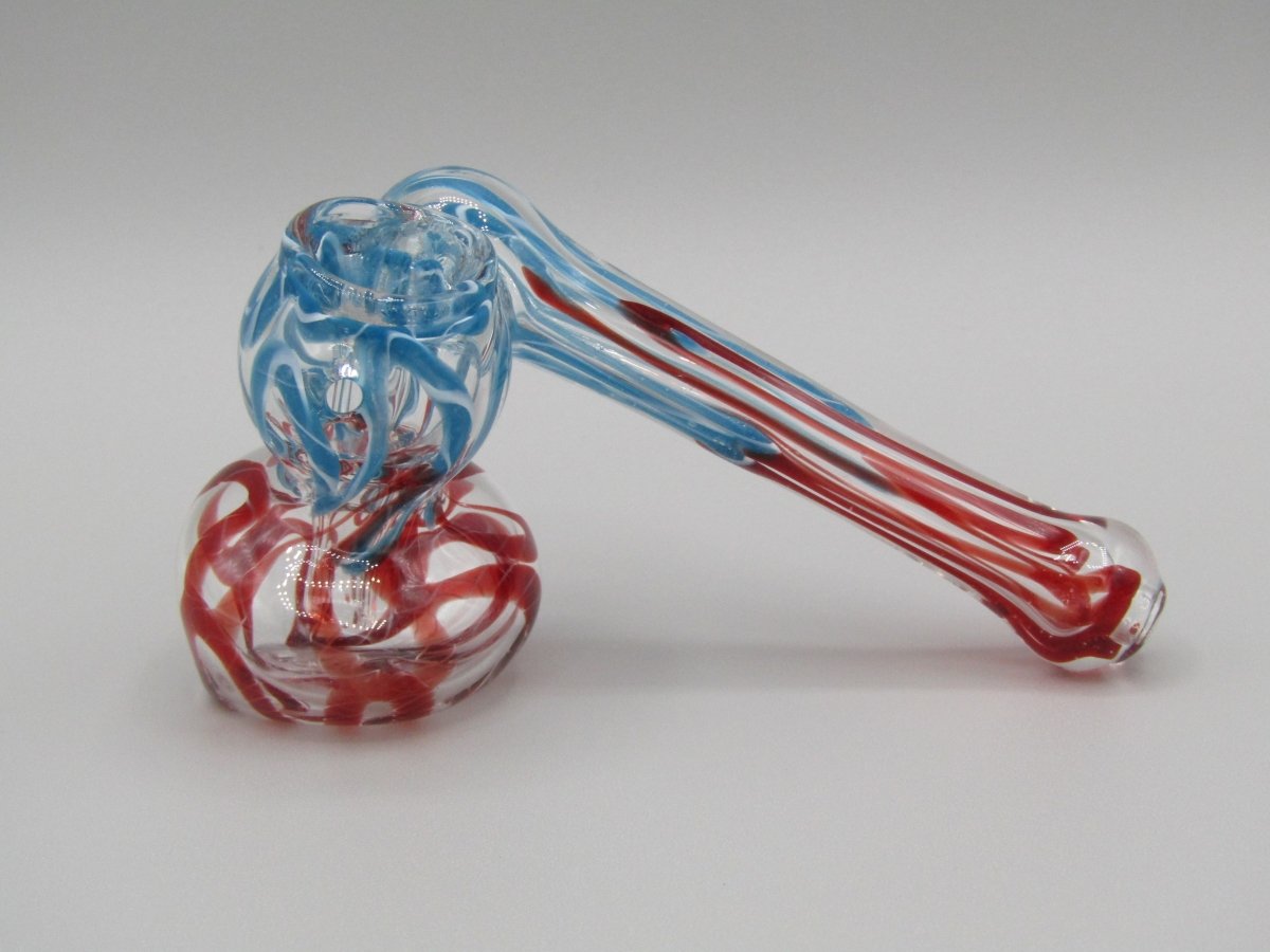 Left side view 4" sidecar swirl hammer bubbler w/ blue and red color accents.