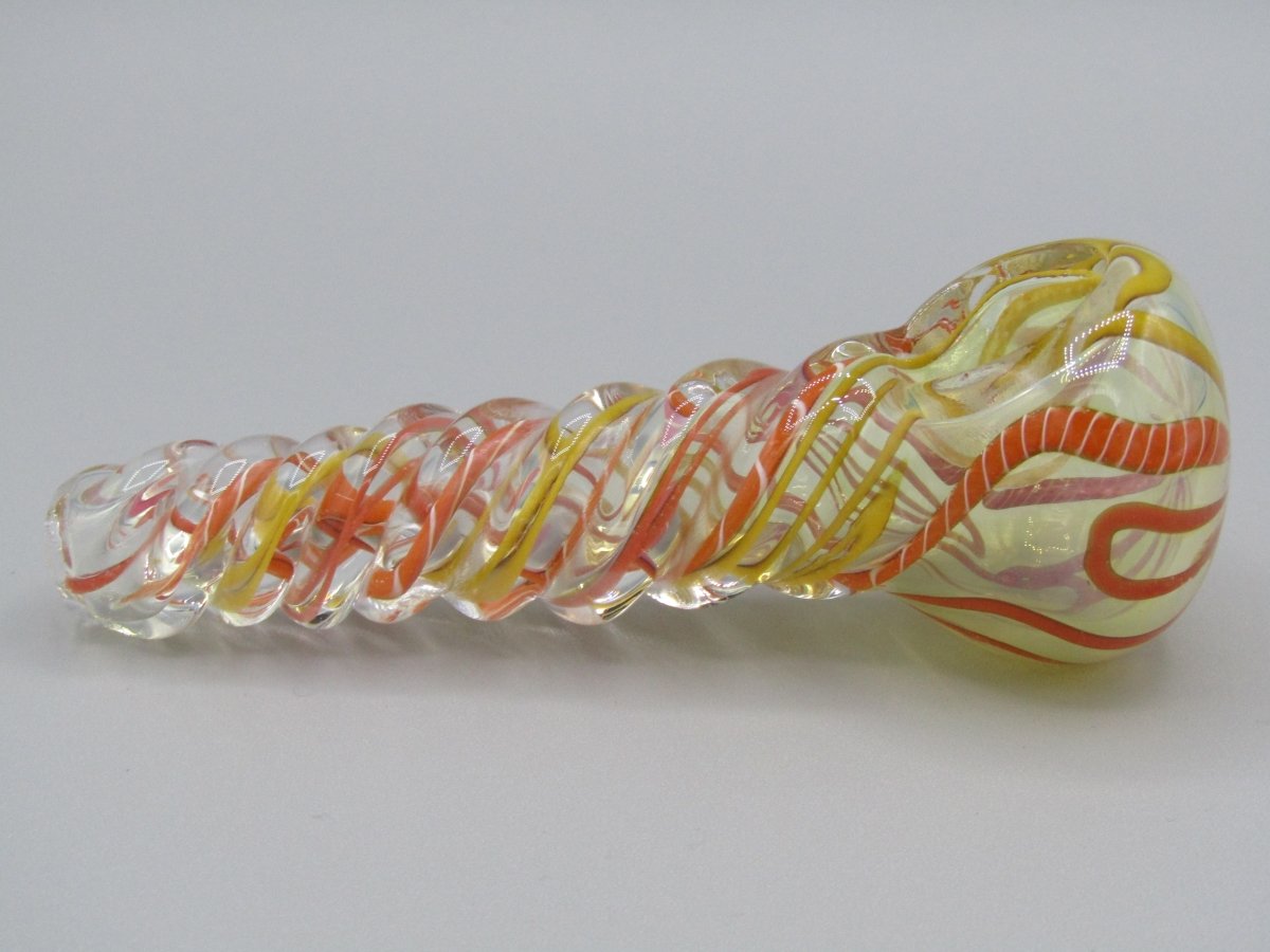 Right side view 5" twisted spiral glass hand pipe orange/yellow color combo.