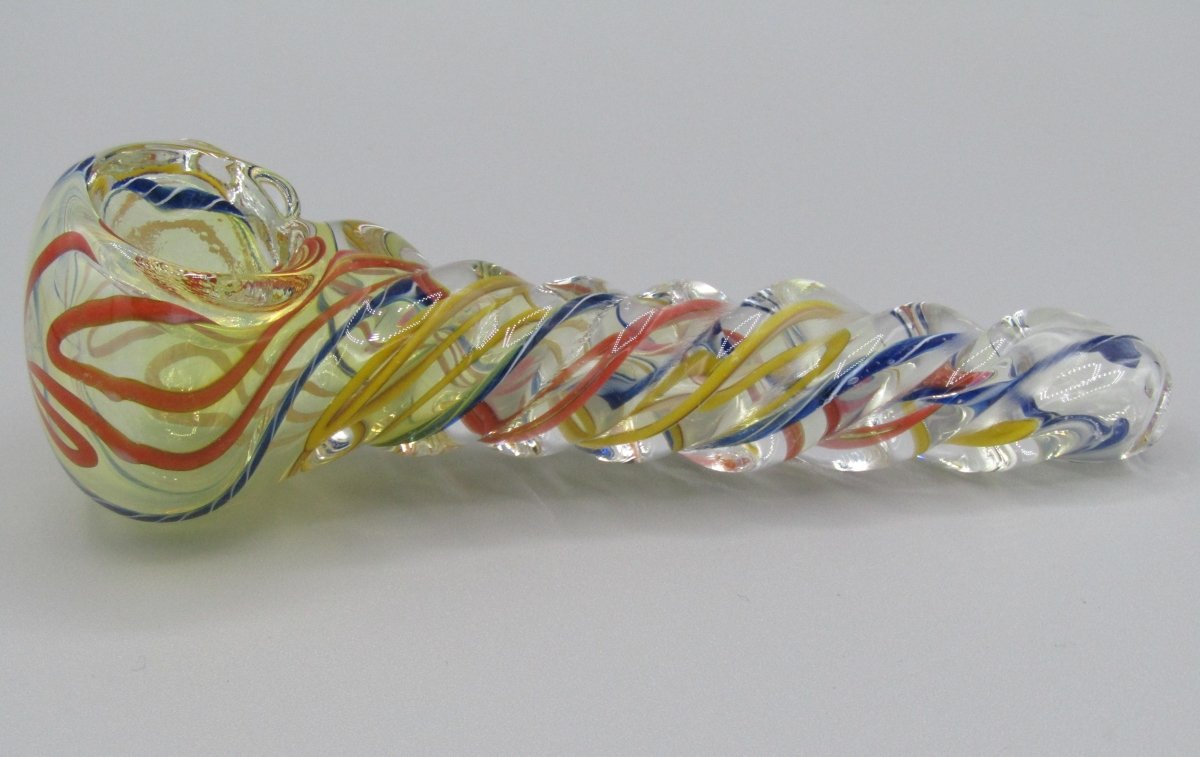 Left side view 5" twisted spiral glass hand pipe blue/orange/yellow color combo.