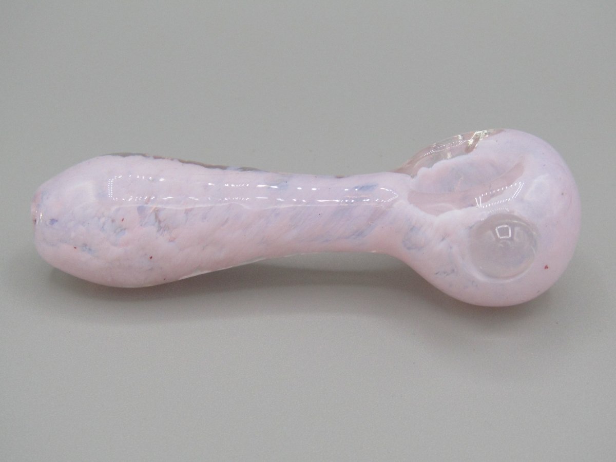 Right side view 4" fritted spoon hand pipe w/ knocker and milky pink color.