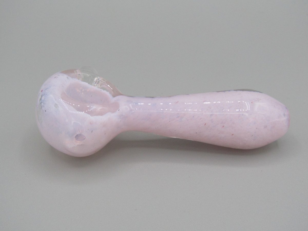 Left side view 4" fritted spoon hand pipe w/ knocker and milky pink color.