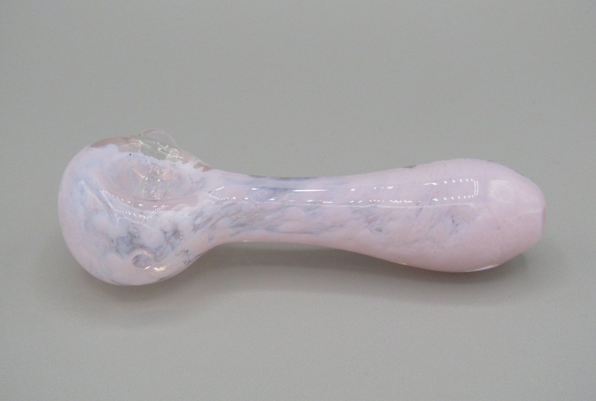 Left side view 4" fritted spoon hand pipe w/ knocker and milky pink color.