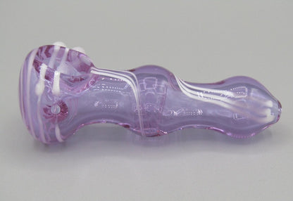 Left side view 3.5" swirl bulged spoon hand pipe w/ triple knockers and translucent purple color w/ white swirls.