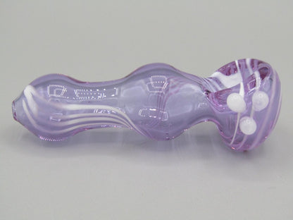 Left side view 3.5" swirl bulged spoon hand pipe w/ triple knockers and translucent purple color w/ white swirls.