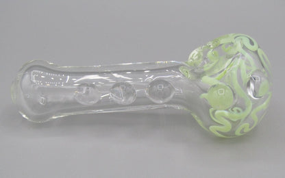 Right side view 4" swirl spoon hand pipe, clear glass w/ multiple knockers.